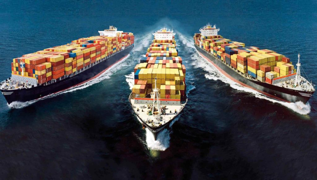 Container ships carrying cargo across the ocean